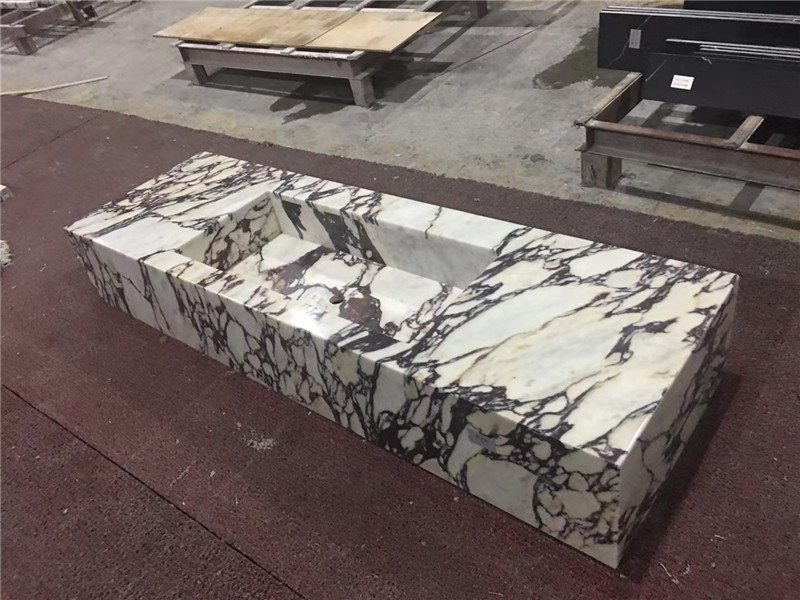 Custom Calacatta Viola marble sink and vanity fabrication