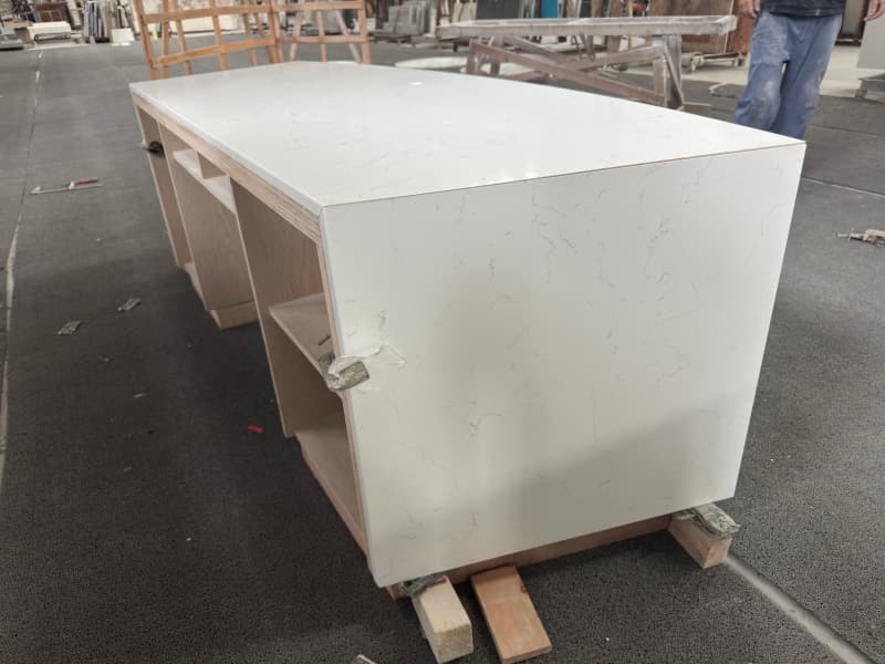 Curved counter with wooden cabniet