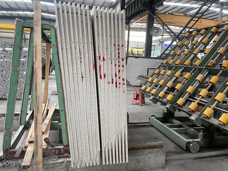 A bundle of marble slabs waiting for inspection