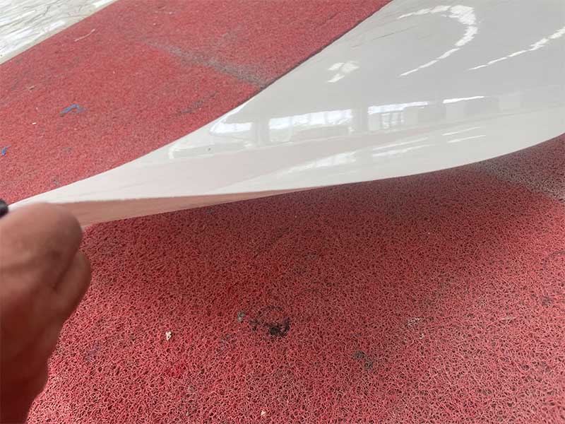 Close-up showing thin marble panel flexibility