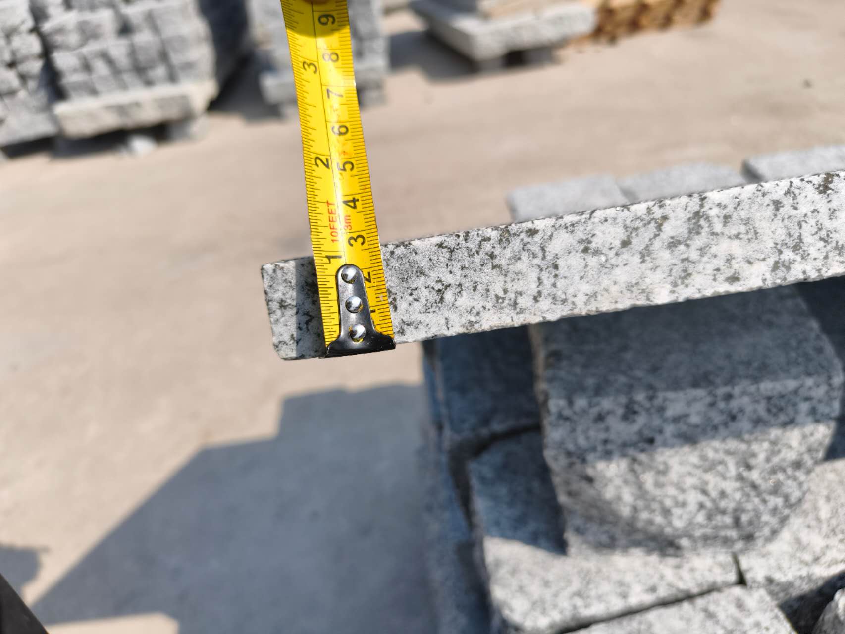 Tema Grey granite step and tread crates prepared for container shipment
