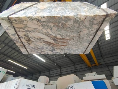 Selected Calacatta Viola marble block before slab cutting