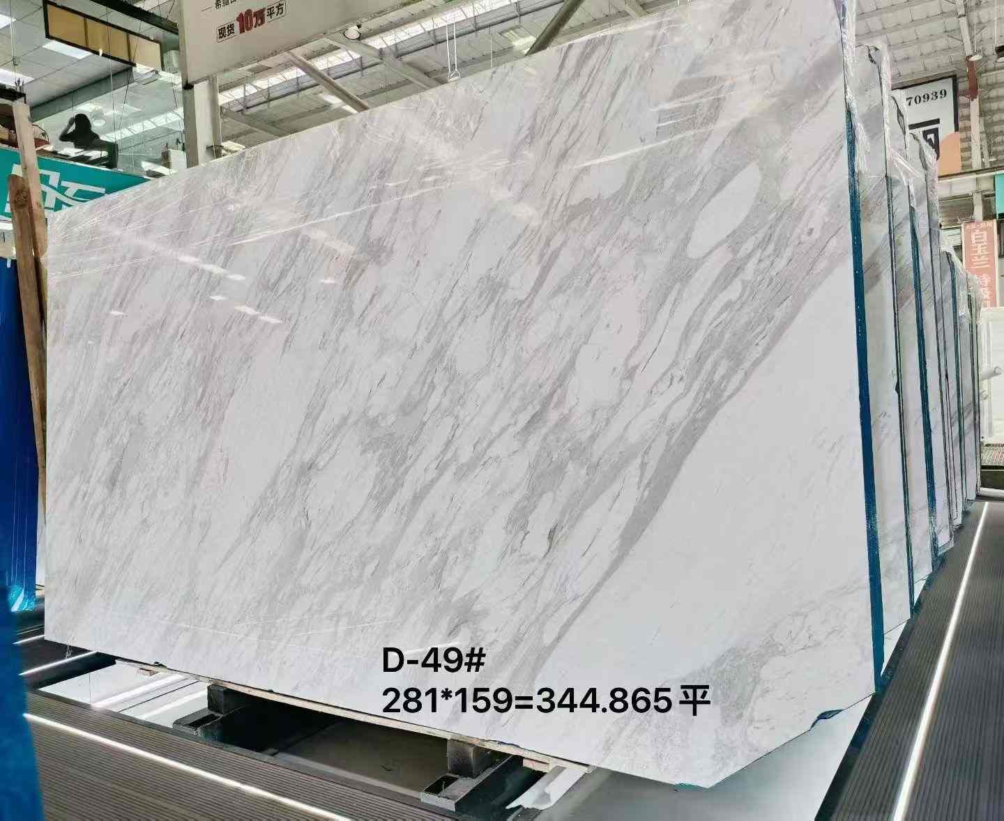 Large Quarry Volakas marble slab with broad diagonal grey veining and cloudy grey-white variation