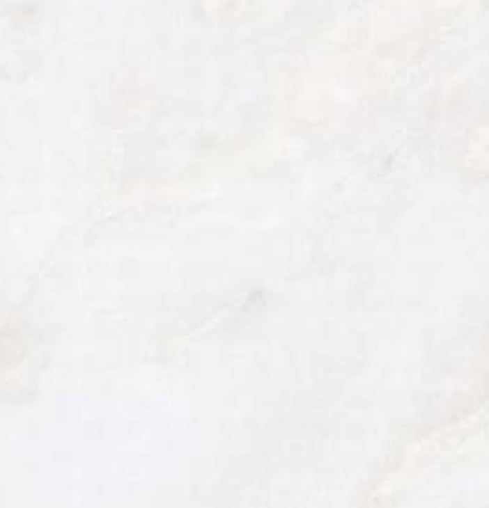 Afyon White marble slab with a neutral white background and subtle cloudy movement