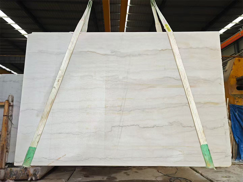 Guangxi White marble slab with soft grey clouding on a milky white background